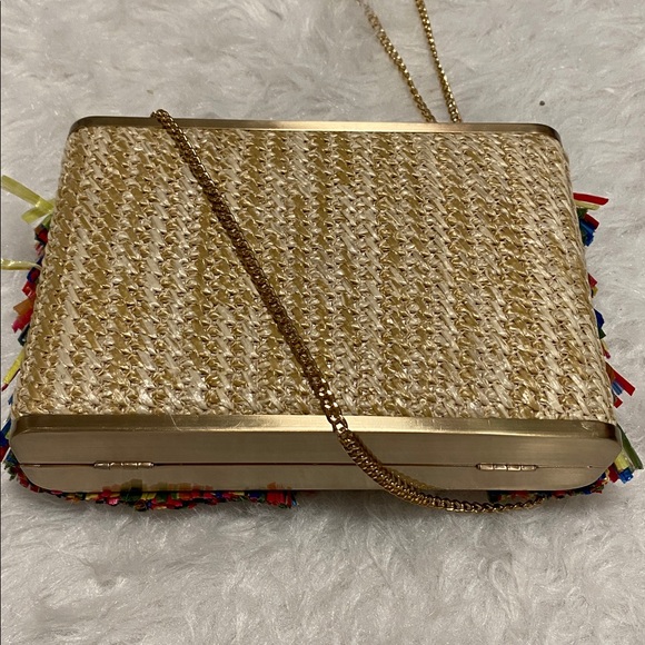 Olga Berg Carlita Carnivale multi-color raffia fringe clutch gold-tone chain.